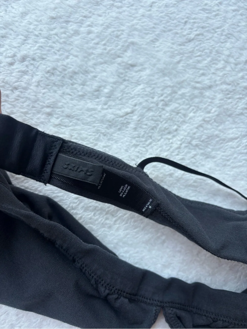 SKIMS Black Triangle Bralette - Wireless Everyday Support - Picture 2 of 3